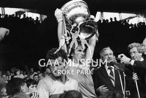 Jimmy Deenihan raising the Sam Maguire Cup in 1081