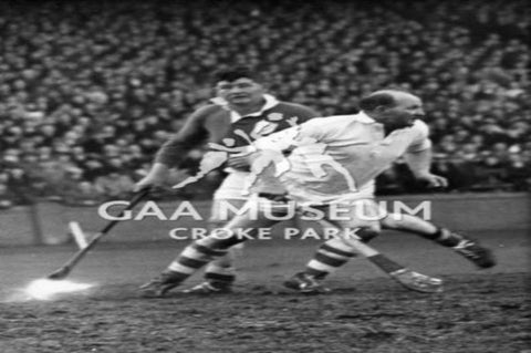 Christy Ring in action during a Munster v Leinster Inter-Provincial Hurling Match. 