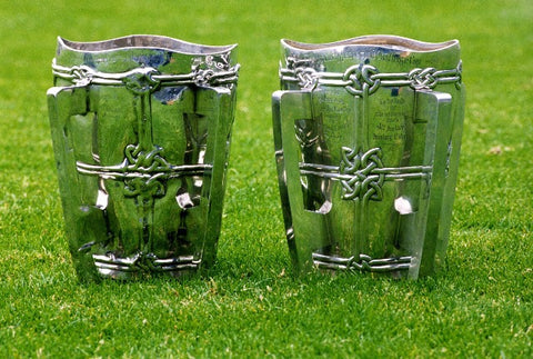 The original Liam MacCarthy Cup and its replica side by side