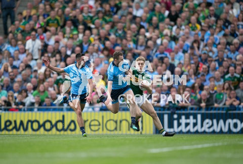 Kerry's Killian Spillane holds off two Dublin players during the 2019 All-Ireland Senior Football Final
