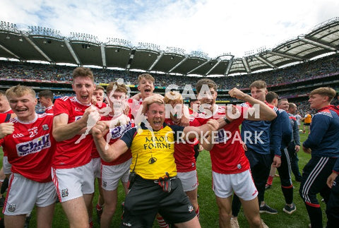 Cork minors and management celebrate after winning the 2019 All-Ireland minor football championship